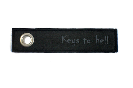 NICI Message Schlüsselanhänger mit Spruch, Variante: "Keys to hell" Schlüsselband schwarz mit grauer Schrift