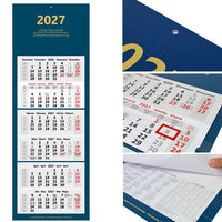 6-Monatskalender 2027 mit Metallringöse, rotem Datumsschieber und Ansichten zu Jahr, Ferien und Feiertagen hinter den Kalenderblöcken