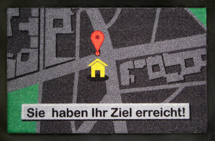 Fußmatte mit lustigem Spruch "Sie haben ihr Ziel erreicht!" Navigationshintergrund