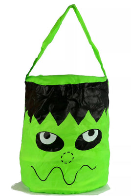 Halloween Pop-Up Tasche "Monster" grün mit aufgedruckten wellenförmigen Mund, schwarzen Augen und Haaren