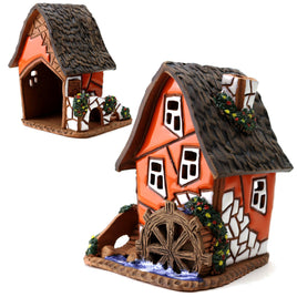Keramik Teelichthaus/Duftlampe "Wassermühle" mit süßen Details, wie Bepflanzung mit rot-gelben Blumen, Haus orange