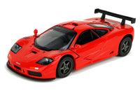 Kinsmart Modellauto McLaren F1 GTR  13cm, mit Flügeltüren, schwarzer Heckspoiler, Sonnenblende mit "GTR" Schriftzug, Farbvariante: Rot