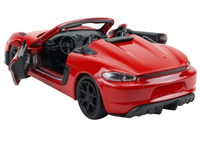 Modellauto Porsche Spyder 718 RS in rot mit öffenenden Türen