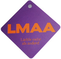 coole haftende Sprüche Schilder mit Saugnapf, Lila mit orangenen Schriftzug "LMMA Lächle mehr als andere!"